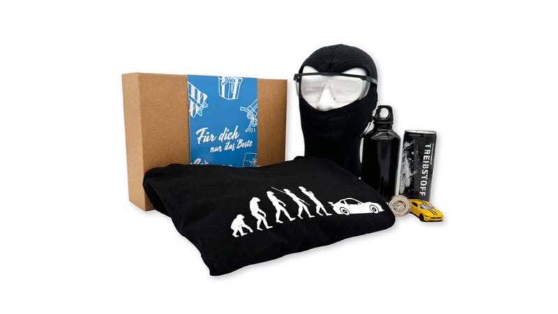 Geschenkbox der Erlebnisfabrik zu Traum- und Sportwagen Erlebnissen mit blauer Banderole.